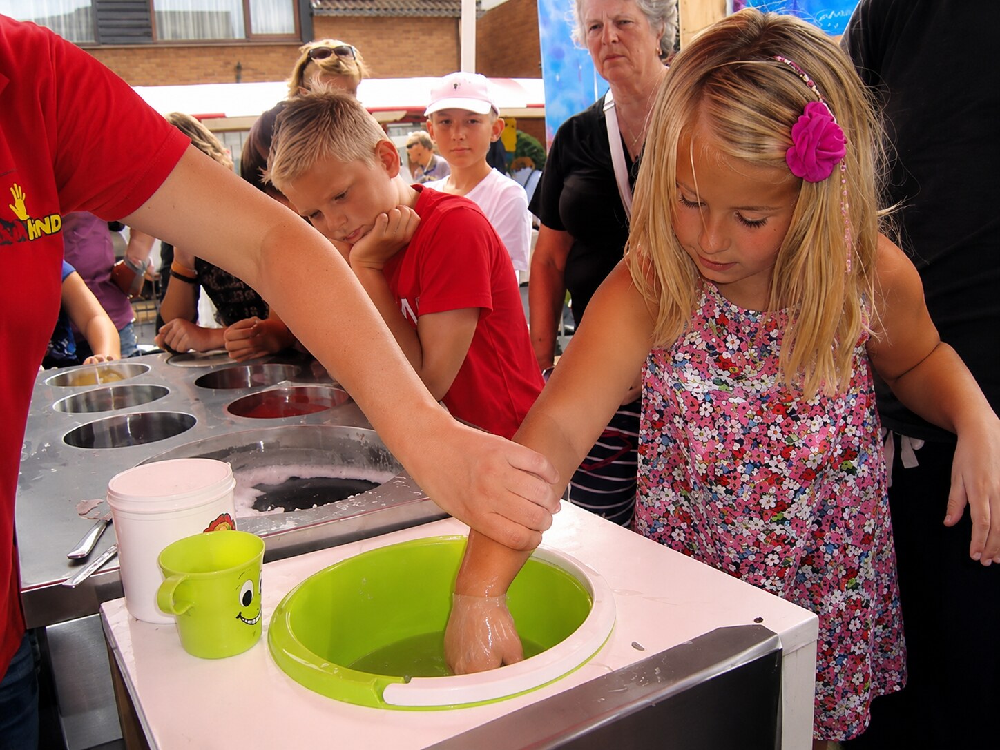 Young guest enjoying the interactive, family-friendly WaxHands hand-casting experience